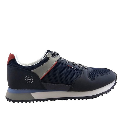 Zapatilla deportiva de hombre azul blanca con cordones y suela blanca