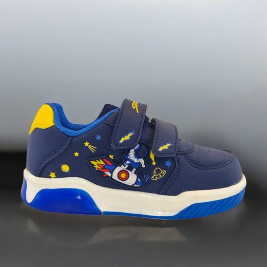 Zapatilla infantil con diseño espacial y cierre de velcro en azul