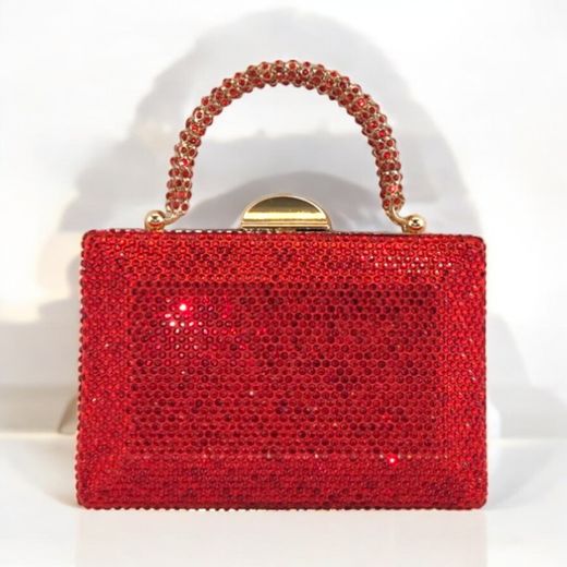 Bolso de mano en rojo brillante con cristales y asa de lujo