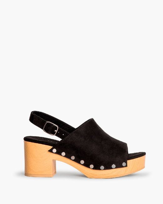 Sandalias tipo zueco color negro de Corina