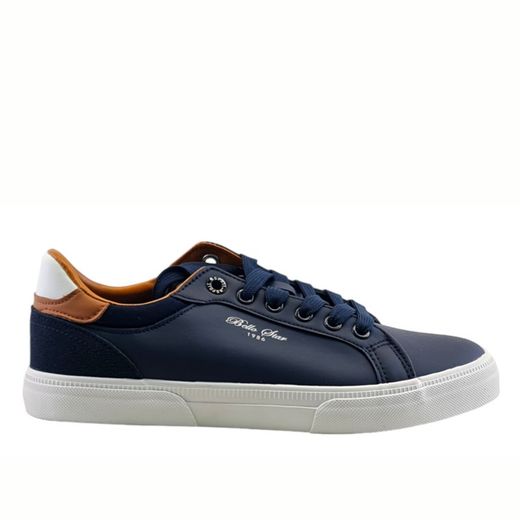 Zapatilla clásica de hombre color azul de suela plana.