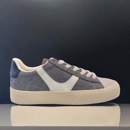 Zapatilla deportiva estilo bamba con corte en combinación de materiales marca Corina